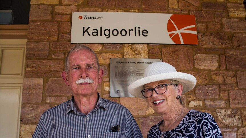 Bruce and Jane Keay stand on the platform at Kalgoorlie Railway Station.