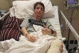 Adam Bart in hospital with his broken leg