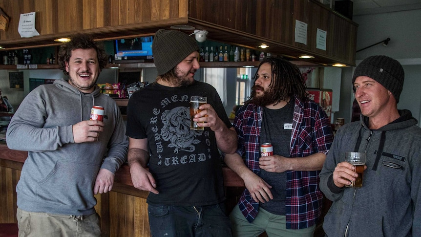Men drinking in pub