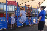 School girls skipping in the playground.