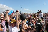 Residents cheer as the Gold Coast wins the right to host the Commonwealth Games