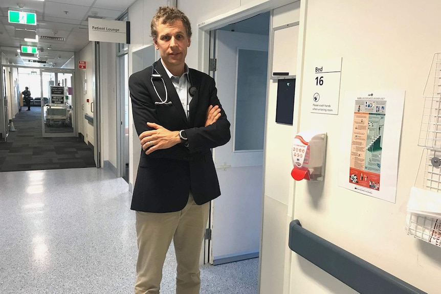 A doctor in a hospital ward