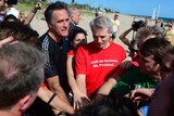 Romney and staff get ready for beach football