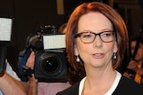 Julia Gillard arrives at the National Press Club in Canberra.