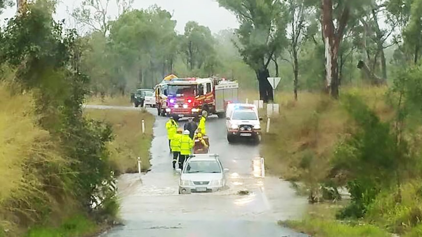 A car stranded in a flooded creek at Yeppoon