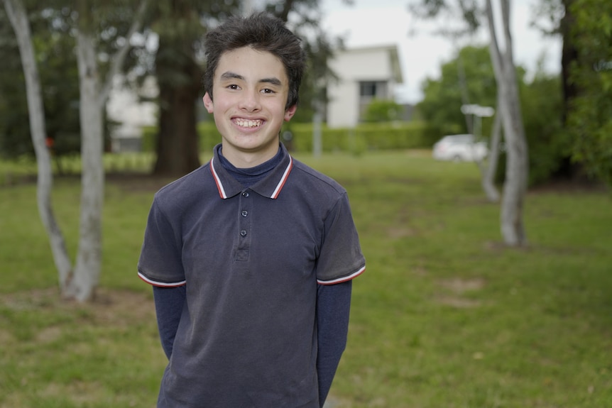 A young boy from Canberra smiles.