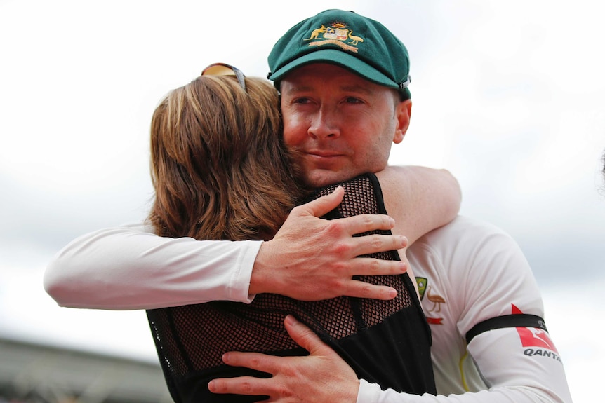 Michael Clarke hugs his mother after playing his last Test
