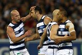 Roaring into the prelims: James Podsiadly (c) kicked three goals in Geelong's 69-point salute.