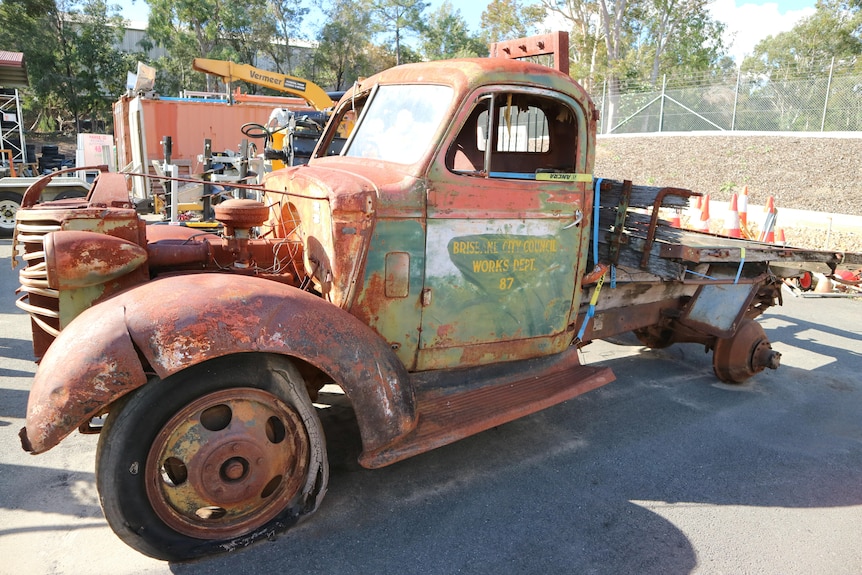 A rusted hulk of an old truck.