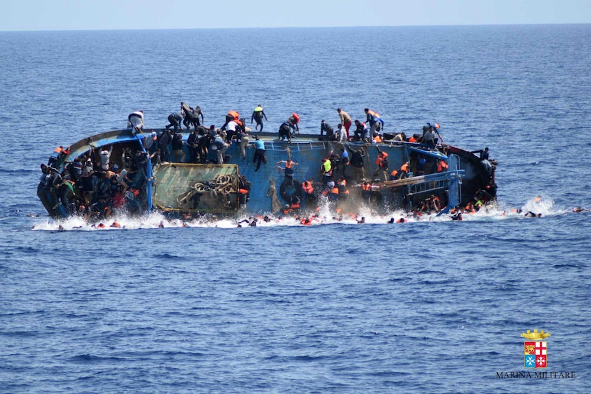 Hundreds thrown in water in capsize