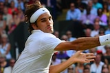 Federer hits a forehand against Raonic