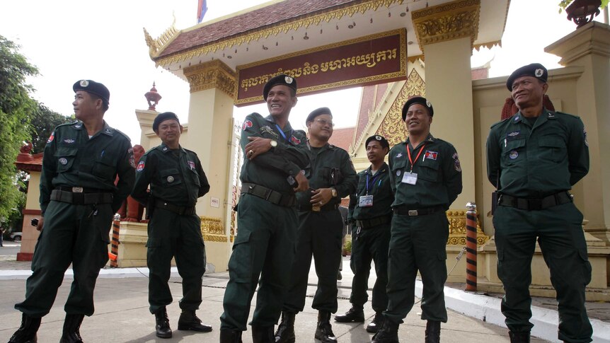 Security stand guard outside the Supreme Court in Phnom Penh.