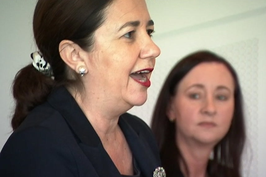 Annastacia Palaszczuk speaks to the media as Yvette D'Ath looks on