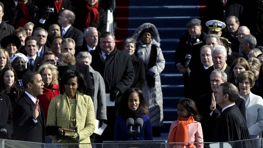 Barack Obama is sworn in by Chief Justice John Roberts as the 44th president of the United States.