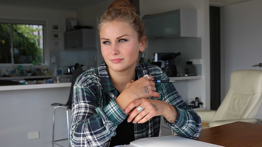 Grace Tame at her desk