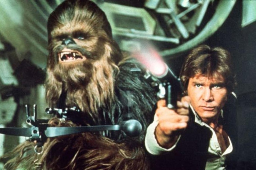 A still image from Star Wars: A New Hope showing Chewbacca and Han Solo