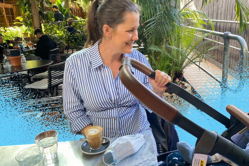 a woman sits in a cafe with a stroller and mask and coffee on table