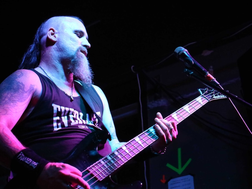 Tim Miedecke plays bass at Beyond Black