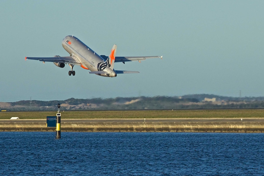 Plane takes of at Sydney Airport