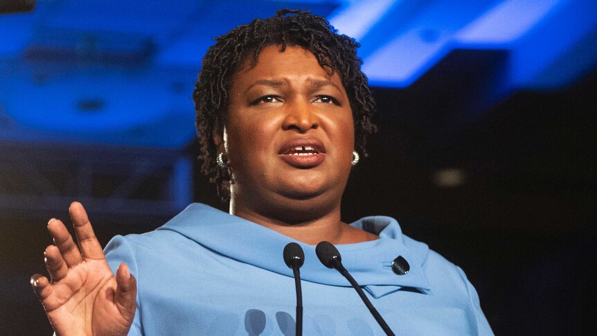 Stacey Abrams at the podium.