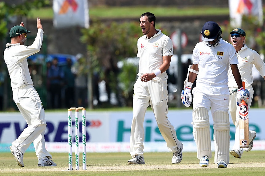 Mitchell Starc celebrates a wicket for Australia against Sri Lanka on day one, second Test in Galle.