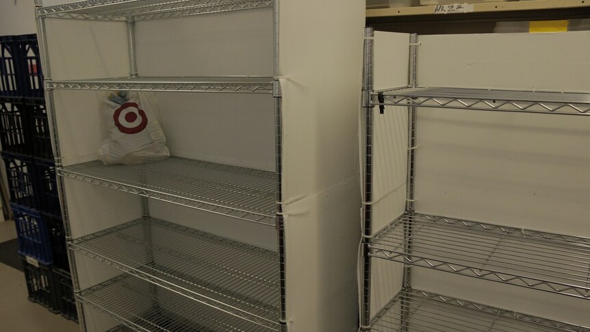 Several empty shelves.