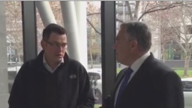 Federal Treasurer Joe Hockey and Victorian Premier Daniel Andrews talk in the ABC Southbank Foyer