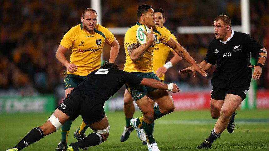 Israel Folau carries the ball for the Wallabies