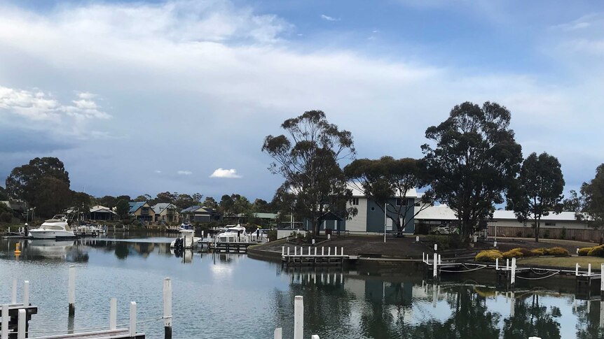 Private jetties on the canals at Paynesville on the Gippsland Lakes. 