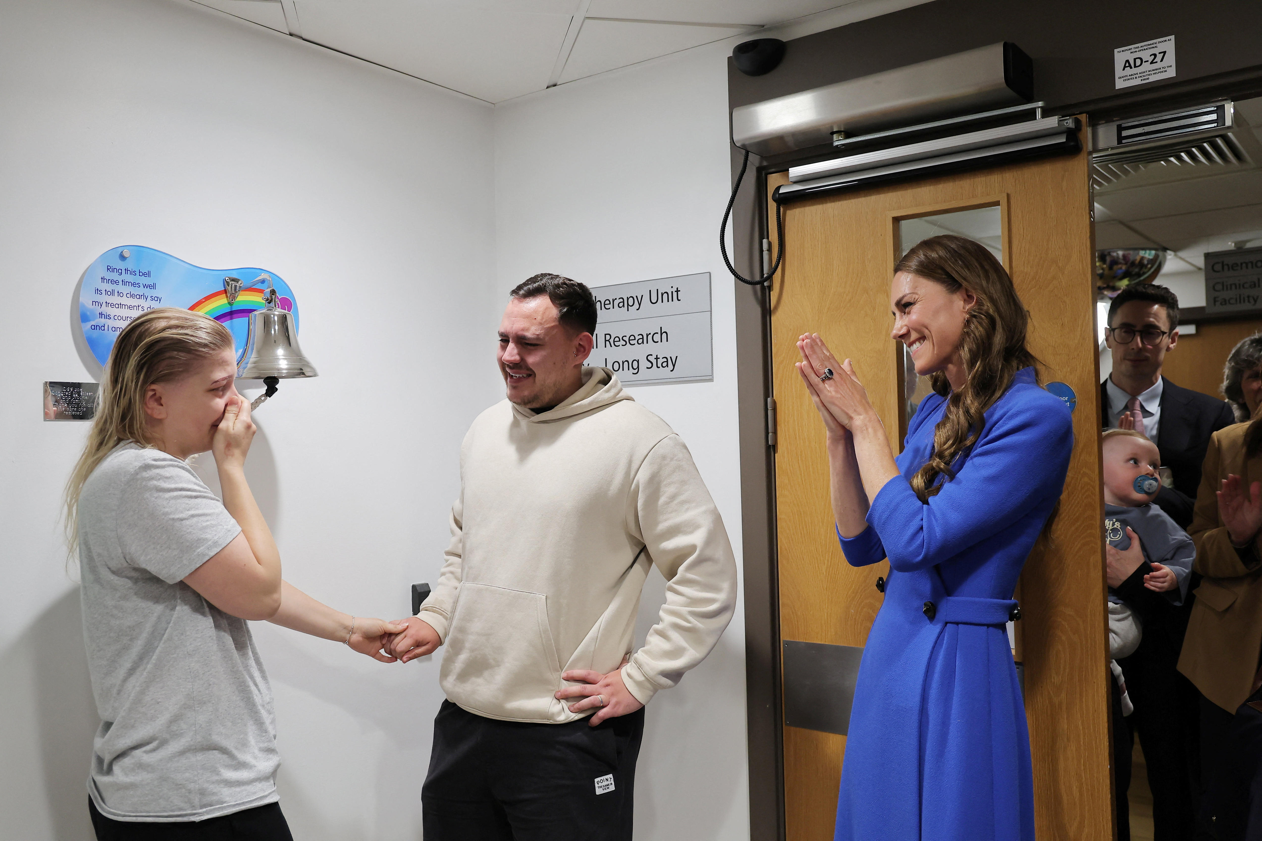 Princess Catherine hugs young mum ringing 'end of cancer treatment' bell