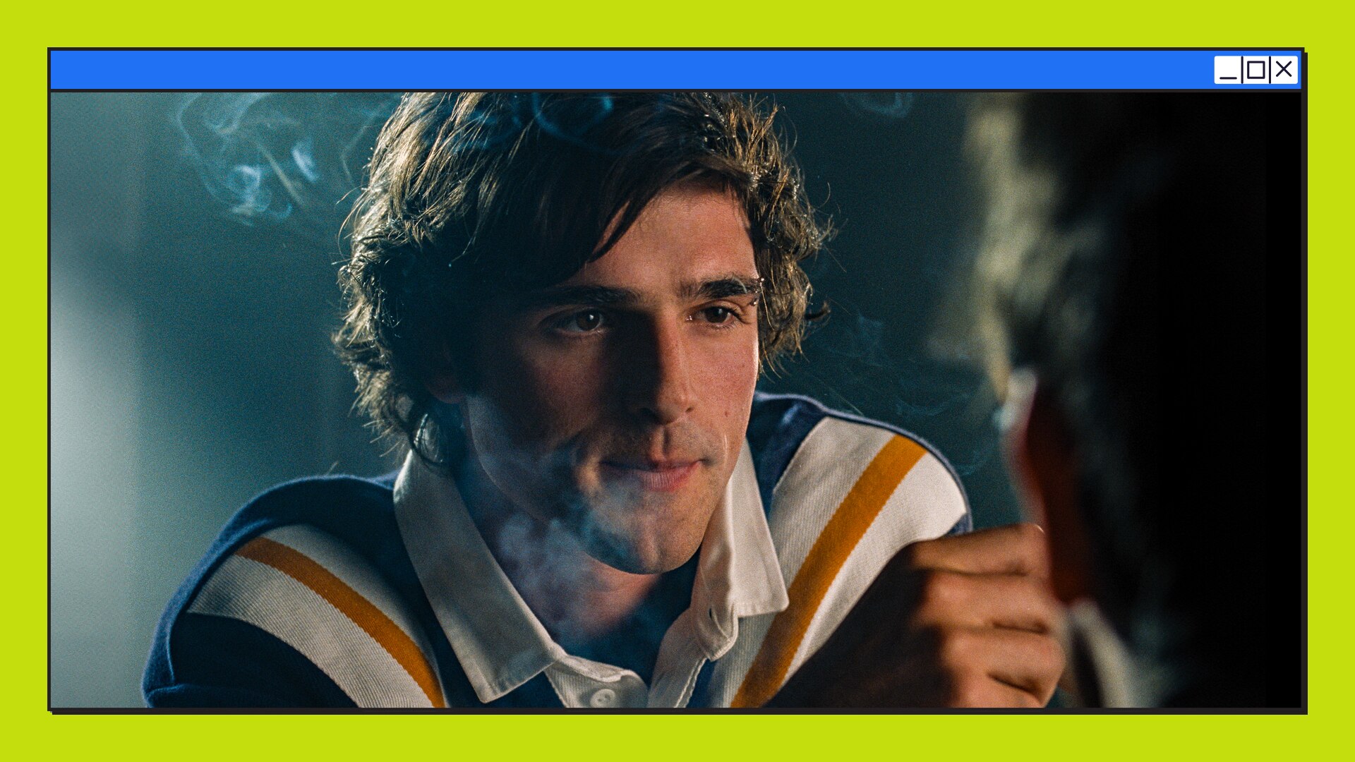 A close up of a man's face, smoke surround him