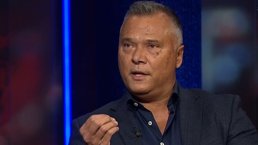 Stan Grant appears on Q+A, wearing a dark suit.