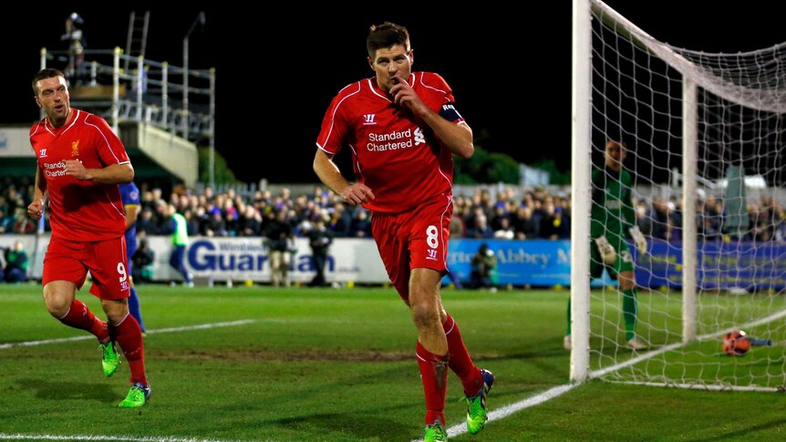 Liverpool's Steven Gerrard celebrates his goal against AFC Wimbledon in the FA Cup third round.