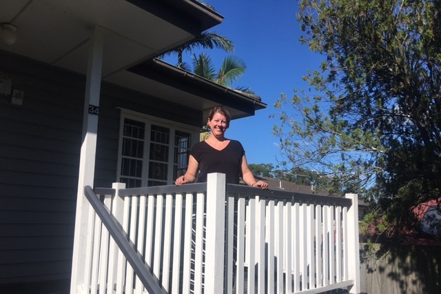 Beyond property management's Heather Jopson at an Inala home, whose rent has decreased from $350 to $320.