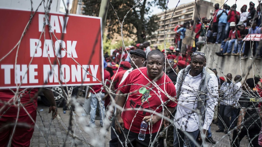 EFF members protest outside court compound
