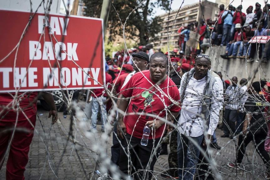 EFF members protest outside court compound