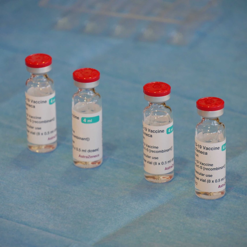 Four vials of the AstraZeneca COVID-19 vaccine.