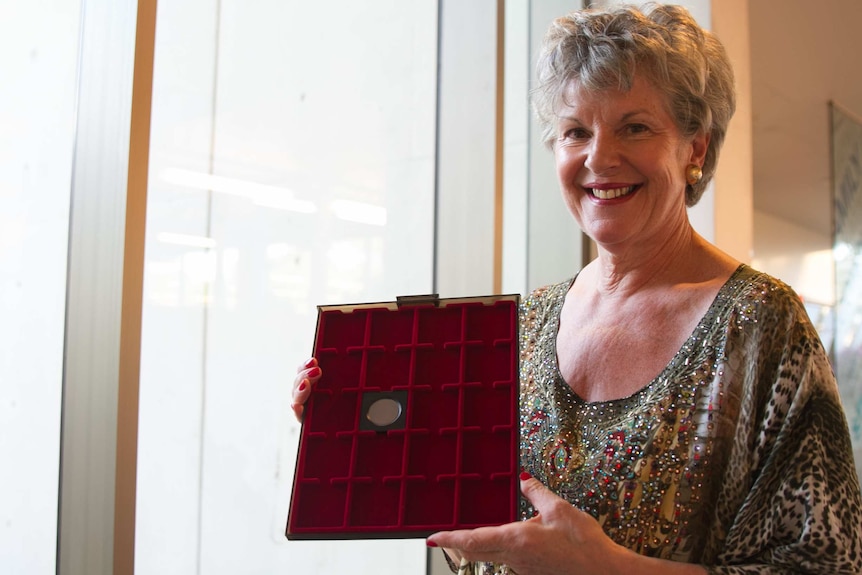 Belinda Downie with the proof penny