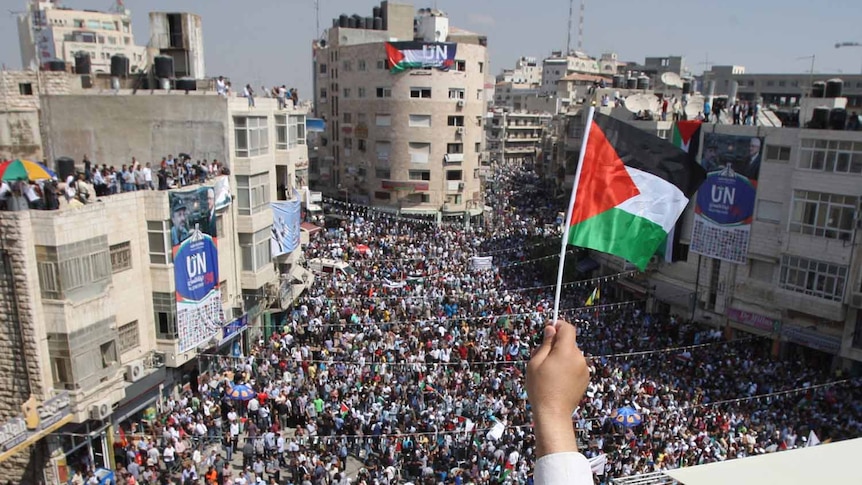 Palestinians attend a demonstration in Ramallah in support of the Palestinian bid for statehood. (AFP: Abbas Momani)