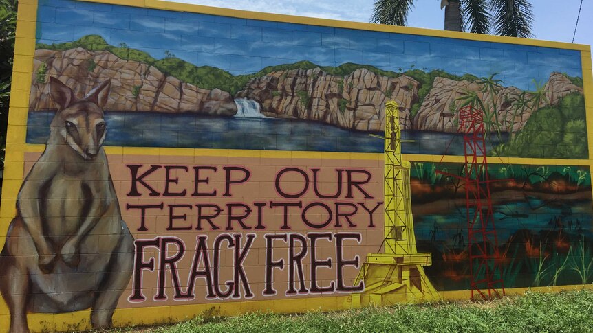 A mural showing the Katherine landscape saying Keep Our Territory Frack Free.