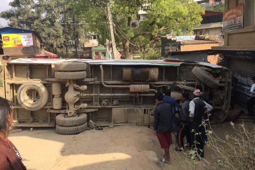 A bus on its slide in Nepal.