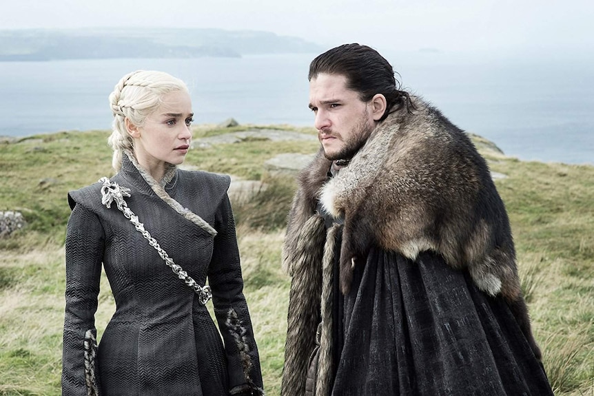 Screenshot of Jon Snow and Daenerys Targaryen on a cliff in the HBO TV series Game of Thrones.