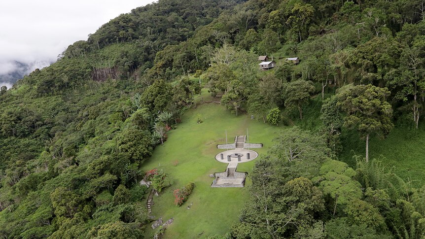 Aerial of the Isurava memorial surrounded by dense jungle on the Kokoda Track.