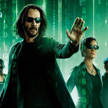 Movie poster featuring the cast of Matrix Resurrections, in front of a green background with streaming digital symbols.