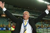 Mariners coach Graham Arnold celebrates winning the A-League.