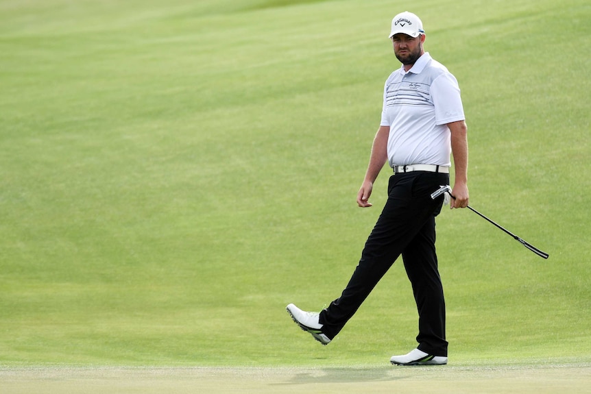 Marc Leishman watches a putt at the US Open