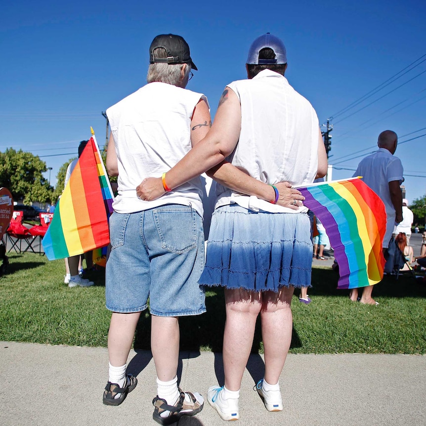 Gay couple at marriage ceremony