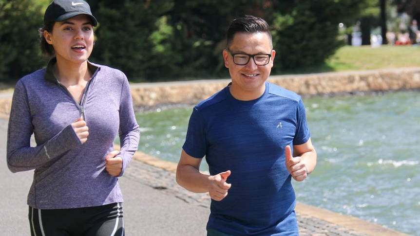 Farishta Arzoo and Zaki Haidari run by the lake.