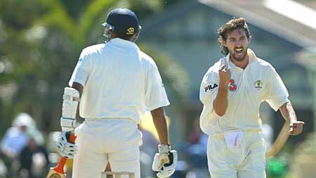 Jason Gillespie celebrates