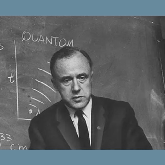 John Wheeler in front of a blackboard with equations at Princeton University in 1967